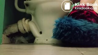 Girl with fluffy slippers pooping on the toilet