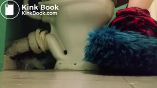 Girl with fluffy slippers pooping on the toilet