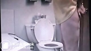 woman shitting out a big log