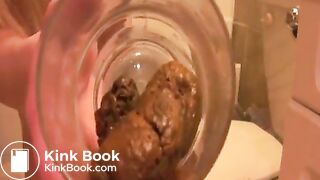girl pooping into glass