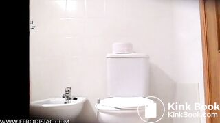 Italian girl is pooping in reverse on top of toilet