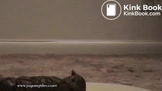 woman giving a birth to a huge log