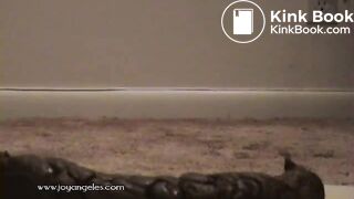 woman giving a birth to a huge log