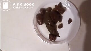 Cute Italian girl is pooping big hard logs in a white plate on the floor