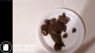 Cute Italian girl is pooping big hard logs in a white plate on the floor