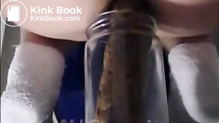 Woman pooping into jar.1