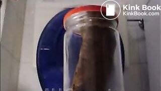 Woman pooping into jar.1