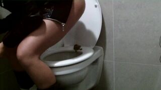Girl smearing scat on airport toilet seat