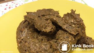 A blonde girl shit then scrutinized it.