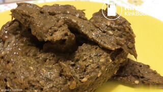 A blonde girl shit then scrutinized it.