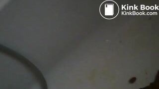 Shitting in bathtub while standing