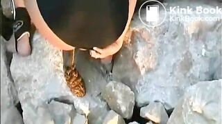 Surfer girl shits in public