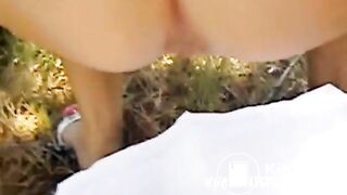 Woman taking a dump in wood - video 2