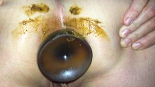 Cleaning butt plug and eating shit