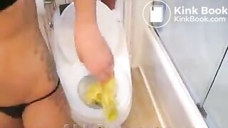 Young girl pooping in toilet