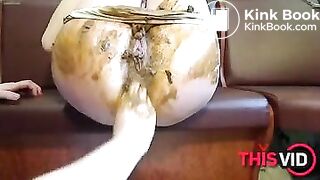 the woman who is inserted by a didlo beyond panty and shit