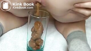 Pawg shitting in glass
