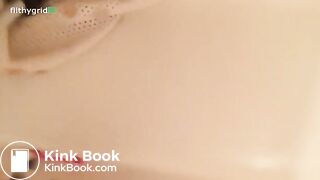 Cute known girl is pooping in the bathtub