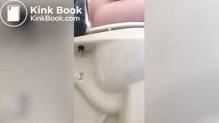 Girl pees and poops on toilet