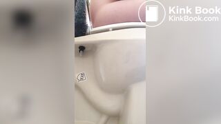 Girl pees and poops on toilet