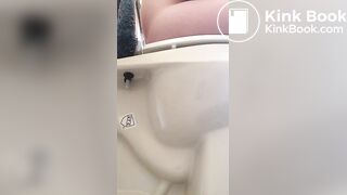 Girl pees and poops on toilet
