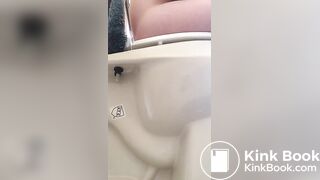 Girl pees and poops on toilet
