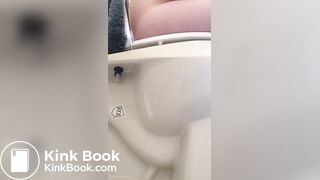 Girl pees and poops on toilet
