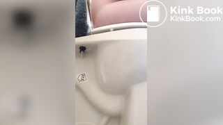 Girl pees and poops on toilet