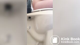 Girl pees and poops on toilet