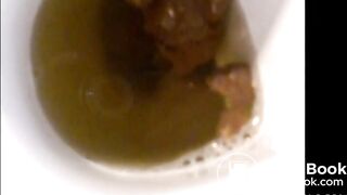 Italian girl is pooping reverse on top of the toilet