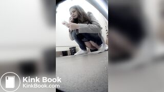 Beautiful girl having a shit and picking nose