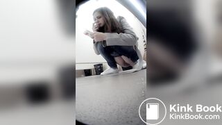 Beautiful girl having a shit and picking nose