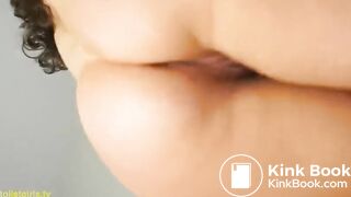 Brunette farting on the toilet 2