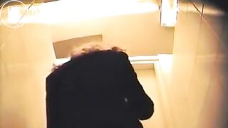 Toilet spycam behind the girl