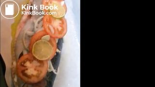woman eats fish