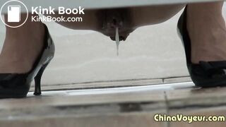 Chinese girl takes a thickest shit