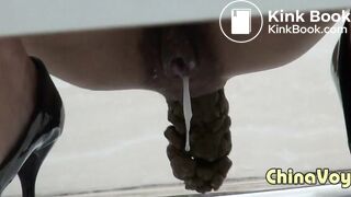 Chinese girl takes a thickest shit