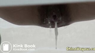 Chinese girl takes a thickest shit