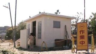 Two girls poop on beach toilet floor