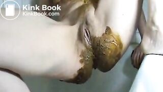 Solo female scat play in the bath