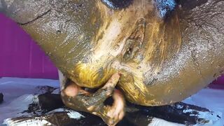 Smearing saved shit and fresh shit and stuffing it in