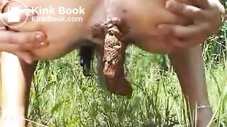 Girl pooping outside