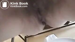 Milf pooping over toilet