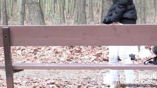 Anni pooping on a bench