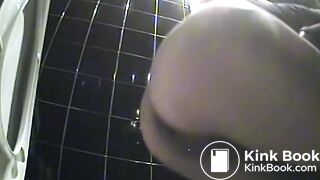 Woman shits in public toilet