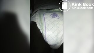 Black girl pooping Luvs Diaper No. 2