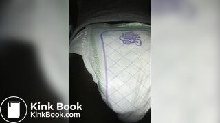 Black girl pooping Luvs Diaper No. 2