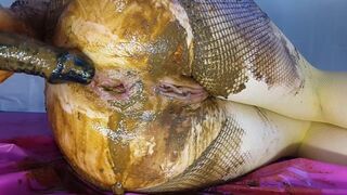 Fishnet pantyhose shitting and toying