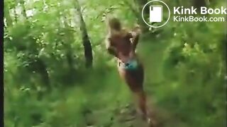Girl in bikini shitting in the forest