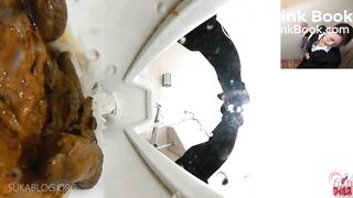 Japanese shitting on toilet.